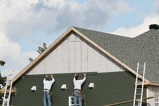 Professional Siding Contractor technician working in Lexington, MA